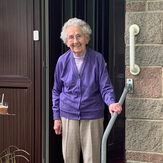 Customer standing on front doorstep