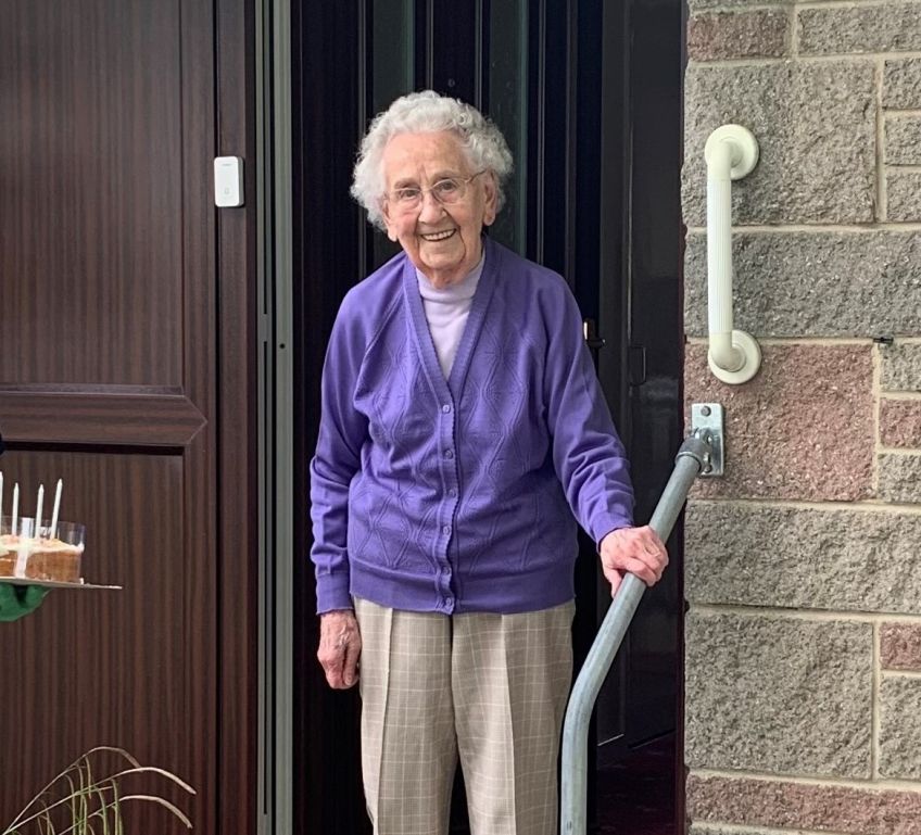 Customer standing on front doorstep